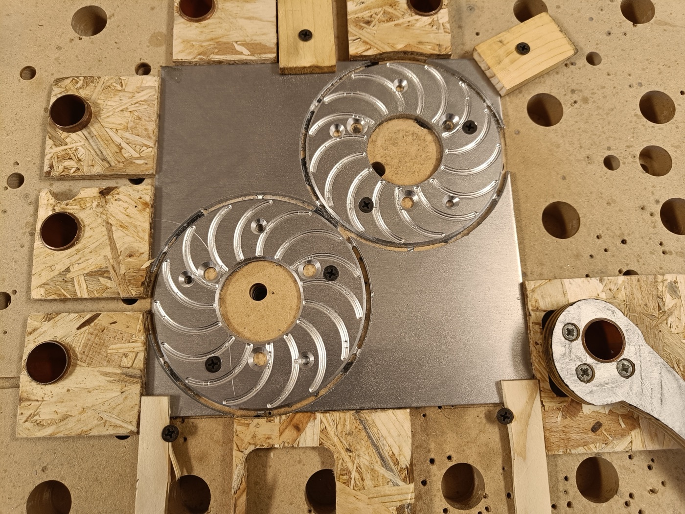 Aluminium brake discs being machined from the drawing